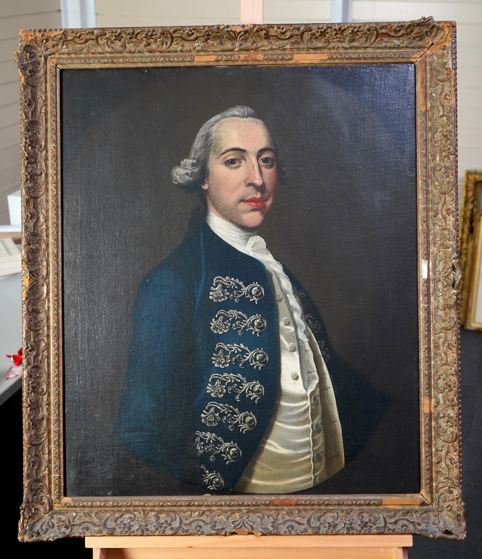 Continental School, 18th century, A portrait of a gentleman wearing a cravat and frock coat